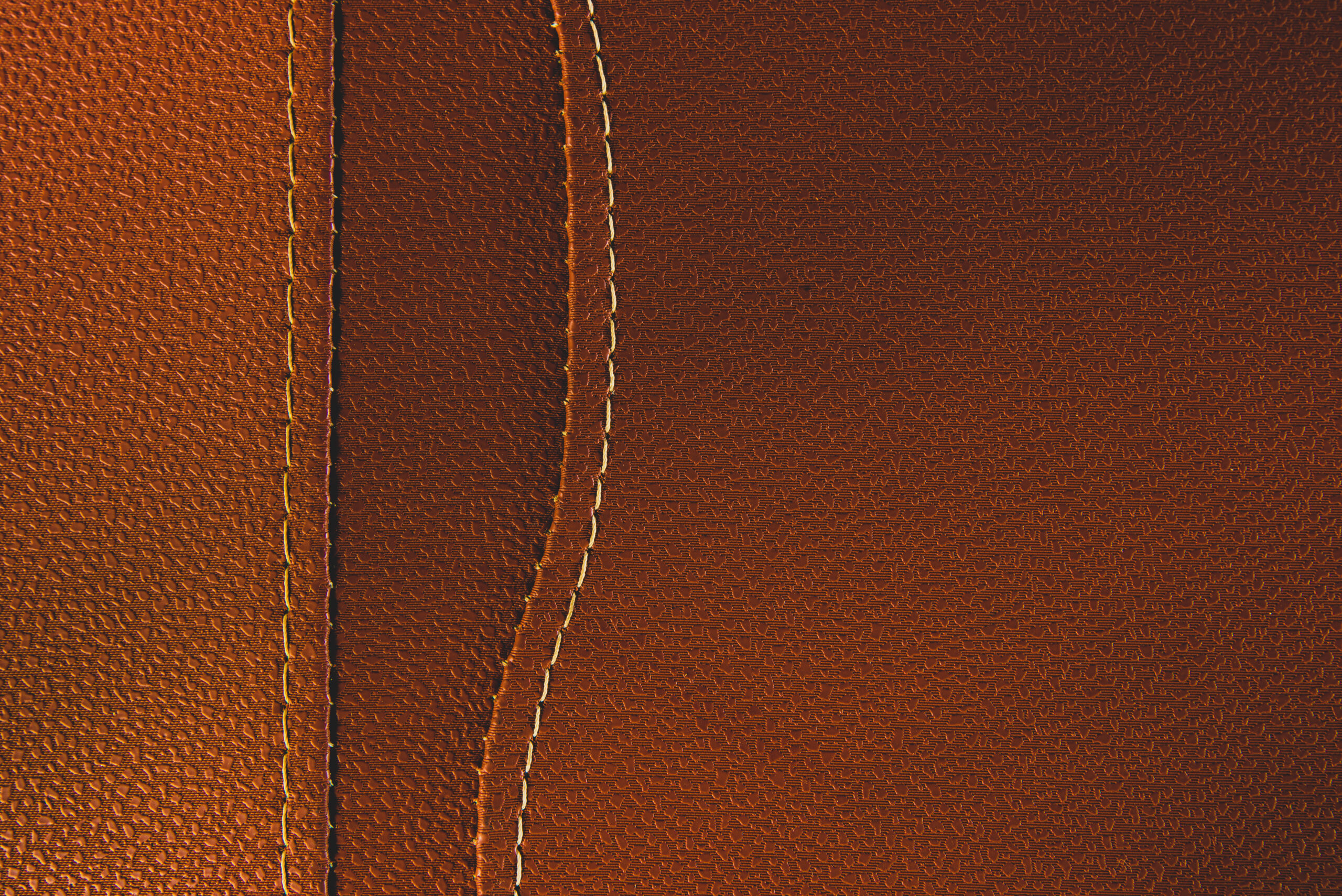 Structured leather with white saddle stitch